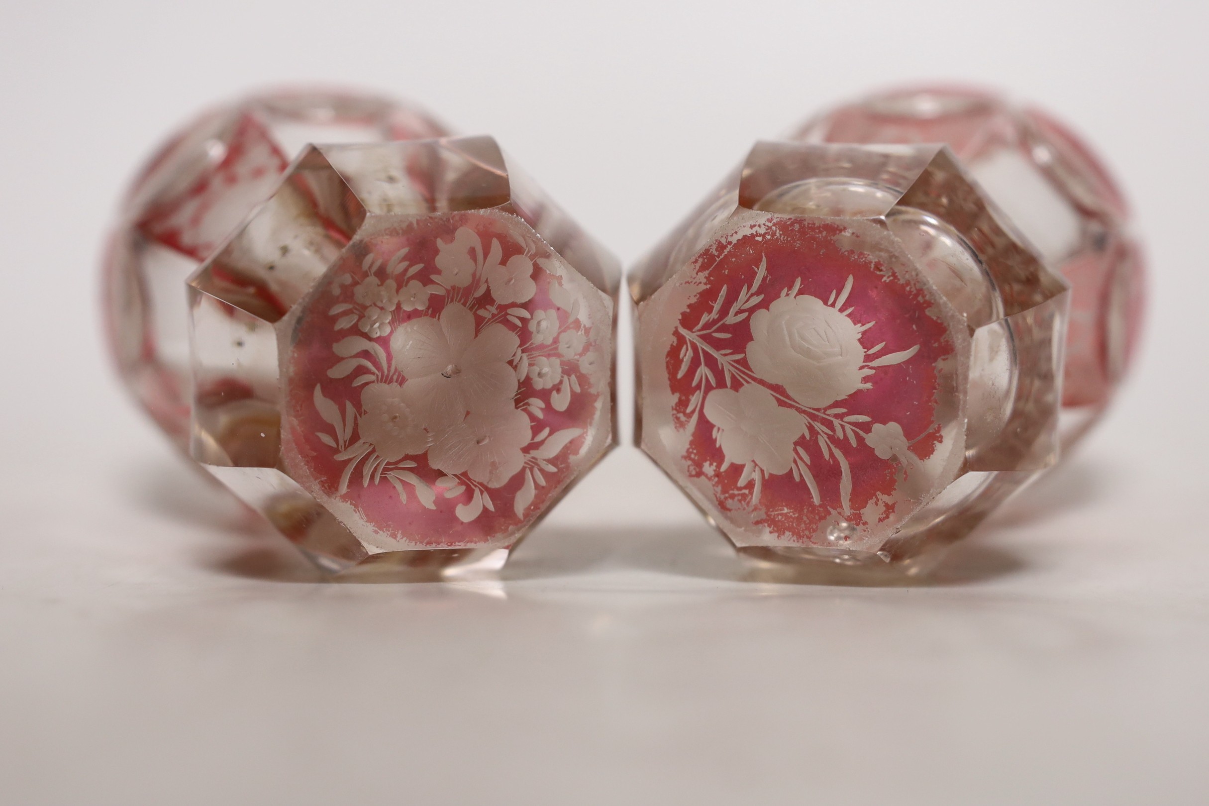 A pair of late 19th century Bohemian wheel engraved ruby stained glass beakers, 13.5cms high